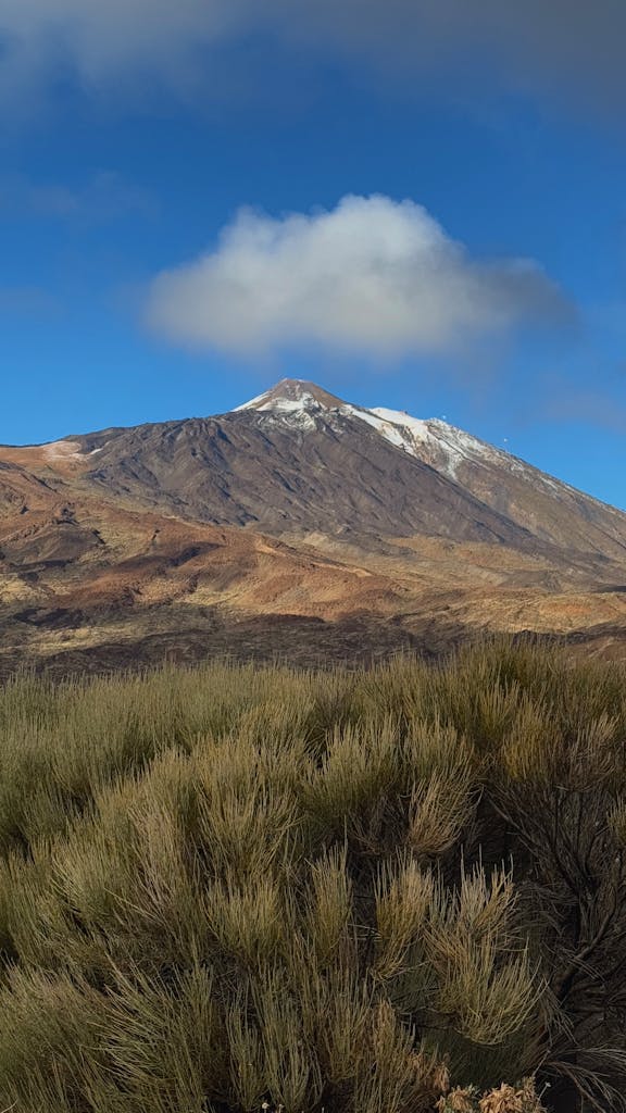 Scenic view of Mount Teide with clear blue skies and surrounding landscape.